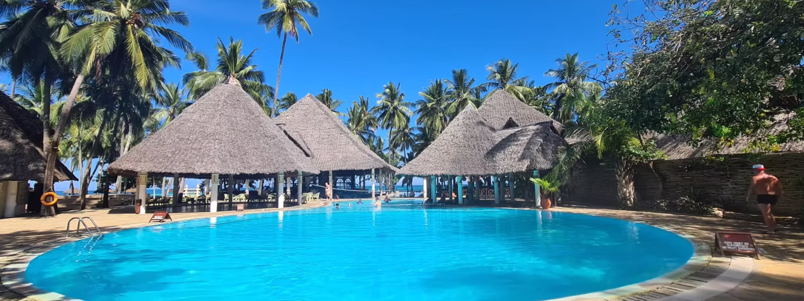 Kenya’s Coast offers idyllic beaches, crystal-clear waters, and rich Swahili culture. From the vibrant city of Mombasa to serene islands like Lamu, it’s a paradise of sun, sea, and history waiting to be explored. Kenya’s Coast is a tropical paradise where white sandy beaches meet crystal-clear turquoise waters, backed by rich cultural heritage and vibrant Swahili traditions. Stretching from the bustling port city of Mombasa to the serene islands of Lamu and Watamu, the coast offers something for every traveler. Mombasa’s Old Town, with its narrow alleys, historic Fort Jesus, and colorful markets, provides a glimpse into the region’s diverse past shaped by Arab, Portuguese, and British influences. Beyond the cities, Kenya’s coastal waters teem with marine life, making it a top destination for snorkeling and diving, especially in protected areas like Watamu Marine Park. The palm-fringed beaches, warm waters, and colorful coral reefs are perfect for water sports, while dhow cruises and island hopping offer unique ways to explore the coastline. Diani Beach, known for its powdery sands and laid-back vibe, is a favorite among travelers looking to unwind or enjoy thrilling adventures like kite surfing and jet skiing. The coastal region is also deeply rooted in Swahili culture, where visitors can experience local cuisine, music, and traditional crafts. From exploring ancient ruins like Gede to savoring fresh seafood and spicy Swahili dishes, the Kenyan Coast is a sensory journey through history, relaxation, and adventure. Whether you’re looking to explore lively markets, relax on sun-soaked beaches, or dive into a world of marine wonders, the Kenyan Coast offers an unforgettable experience steeped in natural beauty and cultural richness.